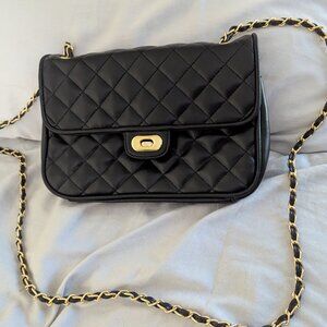 Black quilted purse with gold & black strap, $9.